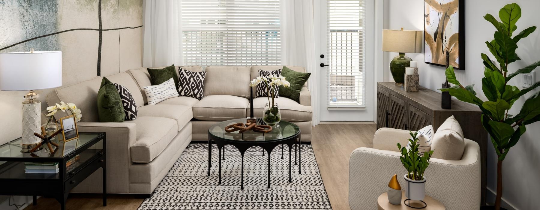 a living room with a couch and a table