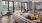 a living room with a large glass door
