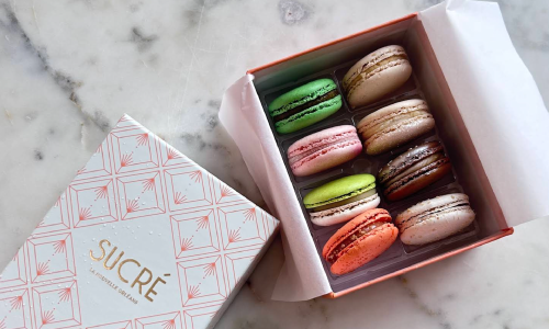 a box of desert from Sucré in Brookhaven