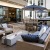 a patio with chairs and umbrellas